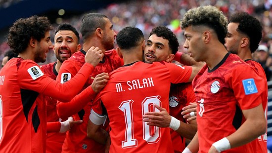 Soccer Football - FIFA World Cup 2026 - Group G - Egypt v Iran - Seattle Stadium, Seattle, Washington, U.S. - June 26, 2026 Egypt's Mahmoud Saber celebrates scoring their first goal with Mohamed Salah and teammates IMAGN IMAGES via Reuters/Steven Bis
