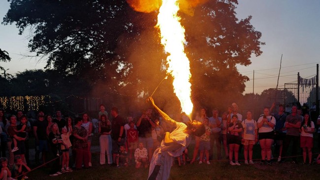 People take part in Midsummer Night celebrations, also known as Saint John's Night and Kupala Night, held around the summer solstice, in the village of Orzyny, Poland, June 20, 2026. REUTERS/Kacper Pempel