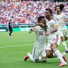 Soccer Football - FIFA World Cup 2026 - Group H - Uruguay v Spain - Estadio Guadalajara, Guadalajara, Mexico - June 26, 2026 Spain's Alex Baena celebrates scoring their first goal with Marc Cucurella and Rodri REUTERS/Eloisa Sanchez