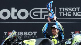 MotoGP - Grand Prix of Netherlands - TT Circuit Assen, Assen, Netherlands - June 28, 2026 Trackhouse MotoGP Team's Ai Ogura celebrates on the podium with a trophy after winning the MotoGP race REUTERS/Omar Havana