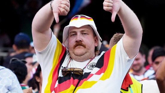 Soccer Football - FIFA World Cup 2026 - Round of 32 - Germany v Paraguay - Boston Stadium, Foxborough, Massachusetts, U.S. - June 29, 2026 A Germany fan looks dejected after the match as Germany are eliminated from the World Cup IMAGN IMAGES via Reut