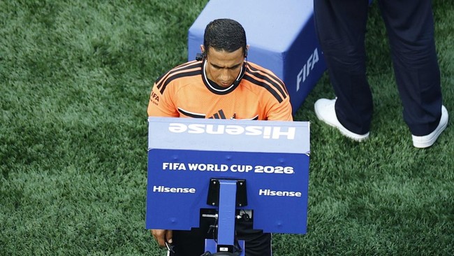 Soccer Football - FIFA World Cup 2026 - Round of 32 - Germany v Paraguay - Boston Stadium, Foxborough, Massachusetts, U.S. - June 29, 2026 Referee Jalal Jayed looks at the VAR monitor before a goal for Germany is disallowed REUTERS/Pilar Olivares