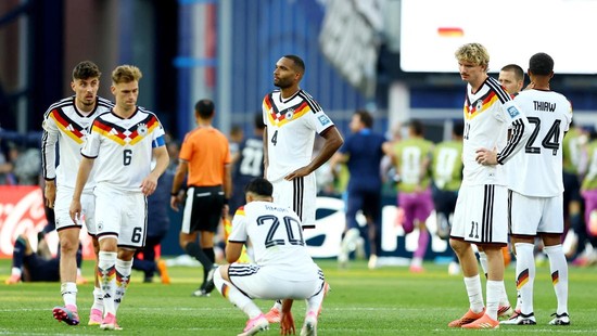 Soccer Football - FIFA World Cup 2026 - Round of 32 - Germany v Paraguay - Boston Stadium, Foxborough, Massachusetts, U.S. - June 29, 2026 Germany's Jonathan Tah, Joshua Kimmich and Nick Woltemade look dejected after the match as Germany are eliminat