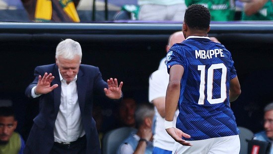 Soccer Football - FIFA World Cup 2026 - Round of 32 - France v Sweden - New York New Jersey Stadium, East Rutherford, New Jersey, U.S. - June 30, 2026 France's Kylian Mbappe with coach Didier Deschamps after being substituted IMAGN IMAGES via Reuters