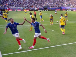 Soccer Football - FIFA World Cup 2026 - Round of 32 - France v Sweden - New York New Jersey Stadium, East Rutherford, New Jersey, U.S. - June 30, 2026 France's Kylian Mbappe and Michael Olise celebrate after Bradley Barcola scores their second goal R