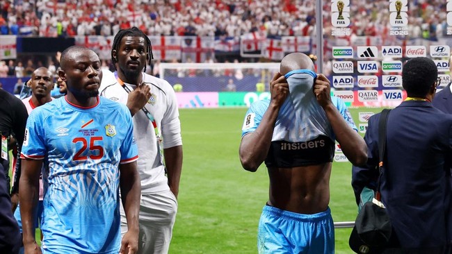 Soccer Football - FIFA World Cup 2026 - Round of 32 - England v DR Congo - Atlanta Stadium, Atlanta, Georgia, U.S. - July 1, 2026 DR Congo's Edo Kayembe and Yoane Wissa look dejected after the match as DR Congo are eliminated from the World Cup REUTE