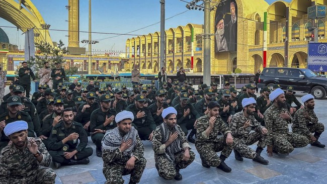 Members of the Basij paramilitary forces gather on the day international delegates participate in a farewell ceremony for Iran's late Supreme Leader Ayatollah Ali Khamenei, who was killed on February 28 during Israeli and U.S. airstrikes on Iran, at