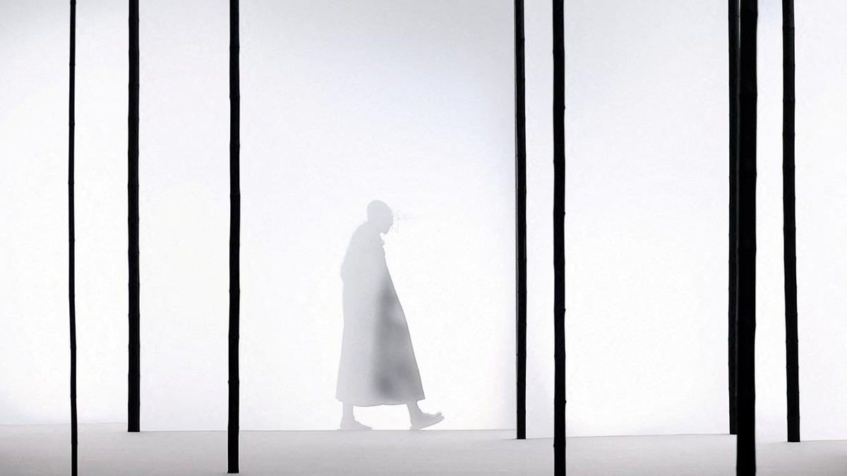 A model presents a creation by designers Yuki Itakura, Sen Kawahara, Nobutaka Kobayashi and IM Men Miyake Design Studio team as part of their Menswear Spring-Summer 2027 collection show for fashion house Issey Miyake during Men's Fashion Week in Pari