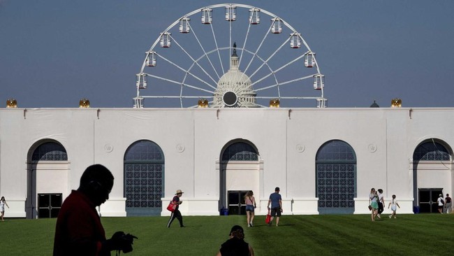 Visitors walk the grounds at the Great American State Fair on the National Mall in Washington, D.C., U.S., June 25, 2026. REUTERS/Nathan Howard