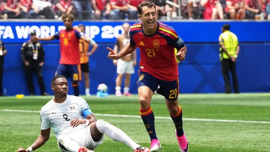 Soccer Football - FIFA World Cup 2026 - Round of 32 - Spain v Austria - Los Angeles Stadium, Inglewood, California, U.S. - July 2, 2026  Spain's Mikel Oyarzabal celebrates scoring their first goal as Austria's David Alaba reacts IMAGN IMAGES via Reut