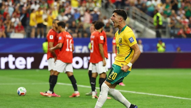Soccer Football - FIFA World Cup 2026 - Round of 32 - Australia v Egypt - Dallas Stadium, Arlington, Texas, U.S. - July 3, 2026 Australia's Cristian Volpato celebrates their first goal, an own goal scored by Egypt's Mohamed Hany REUTERS/Kai Pfaffenba