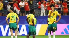 Soccer Football - FIFA World Cup 2026 - Round of 32 - Australia v Egypt - Dallas Stadium, Arlington, Texas, U.S. - July 3, 2026 Australia's Cristian Volpato, Nestory Irankunda and Lucas Herrington look dejected after the match as Australia are elimin
