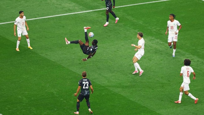 Soccer Football - FIFA World Cup 2026 - Round of 16 - Canada v Morocco - Houston Stadium, Houston, Texas, U.S. - July 4, 2026 Canada's Tani Oluwaseyi reacts REUTERS/Hannah Mckay