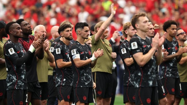 Soccer Football - FIFA World Cup 2026 - Round of 16 - Canada v Morocco - Houston Stadium, Houston, Texas, U.S. - July 4, 2026 Canada's Stephen Eustaquio and teammtes look dejected after the match as Canada are eliminated from the World Cup IMAGN IMAG