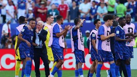 Soccer Football - FIFA World Cup 2026 - Round of 16 - Paraguay v France - Philadelphia Stadium, Philadelphia, Pennsylvania, U.S. - July 4, 2026  France coach Didier Deschamps and France's Kylian Mbappe celebrate after the match as France qualify for