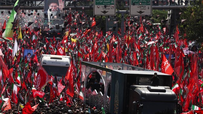 A vehicle carrying coffins of Iran's late Supreme Leader Ayatollah Ali Khamenei and his family members, on the day people attend a funeral procession for Khamenei, who was killed on February 28 in Israeli and U.S. airstrikes, in Tehran, Iran, July 6,