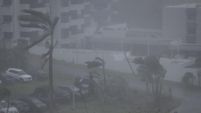 Strong wind brought by Super Typhoon Bavi hits Guam on July 6, 2026. (Photo by Yuichi YAMAZAKI / AFP)