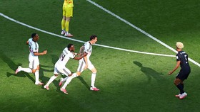 Soccer Football - FIFA World Cup 2026 - Round of 16 - United States v Belgium - Seattle Stadium, Seattle, Washington, U.S. - July 6, 2026 Belgium's Hans Vanaken celebrates scoring their third goal with Dodi Lukebakio and Youri Tielemans as Matt Frees
