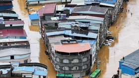 A drone view shows flooding in Pingshan village after heavy rainfall brought by Typhoon Maysak, in Hengzhou, Guangxi Zhuang Autonomous Region, China July 6, 2026. cnsphoto via REUTERS