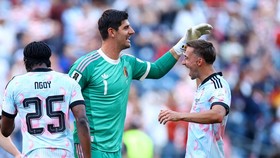Soccer Football - FIFA World Cup 2026 - Round of 16 - United States v Belgium - Seattle Stadium, Seattle, Washington, U.S. - July 6, 2026 Belgium's Thibaut Courtois celebrates after the match with Timothy Castagne as Belgium qualify for the quarter f