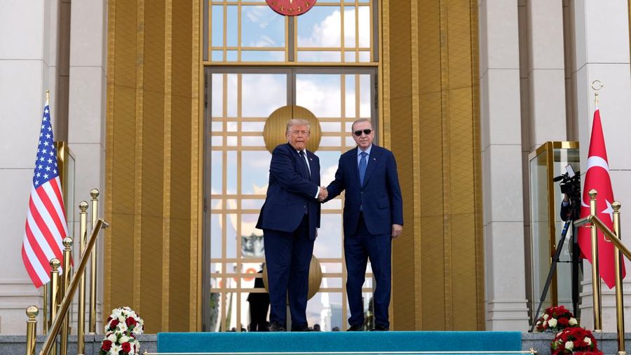 U.S. President Donald Trump shakes hands with Turkish President Recep Tayyip Erdogan during a umum arrival at the Bestepe Presidential Compound at the NATO summit in Ankara, Turkey, Tuesday, July 7, 2026.     Emrah Gurel/Pool via REUTERS
