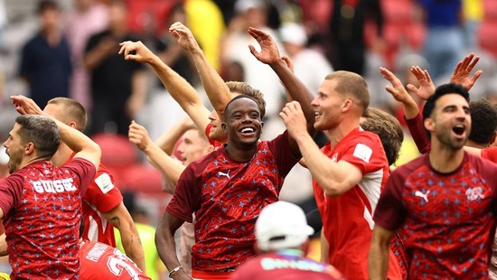 Soccer Football - FIFA World Cup 2026 - Round of 16 - Switzerland v Colombia - BC Place, Vancouver, Canada - July 7, 2026 Switzerland's Denis Zakaria celebrates with teammates after the match REUTERS/Agustin Marcarian