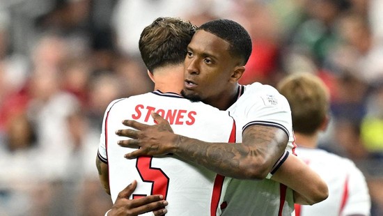 Soccer Football - FIFA World Cup 2026 - Group L - England v Croatia - Dallas Stadium, Arlington, Texas, U.S. - June 17, 2026 England's Ezri Konsa and John Stones embrace before the match IMAGN IMAGES via Reuters/Maria Lysaker