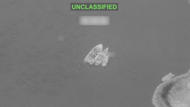 Vessels identified by U.S. Central Command as Islamic Revolutionary Guard Corps boats before they were struck in a new wave of U.S. military strikes against Iran on Tuesday, after three tankers were hit by projectiles in the Strait of Hormuz, in this