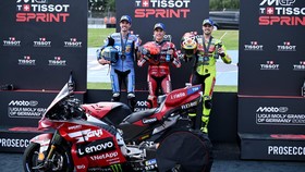 MotoGP - German Grand Prix - Sachsenring, Hohenstein-Ernstthal, Germany - July 11, 2026 Ducati Lenovo Team's Marc Marquez celebrates after winning the sprint race with runner up BK8 Gresini Racing MotoGP's Alex Marquez and third placed Pertamina Endu
