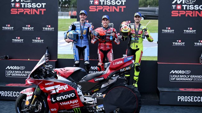 MotoGP - German Grand Prix - Sachsenring, Hohenstein-Ernstthal, Germany - July 11, 2026 Ducati Lenovo Team's Marc Marquez celebrates after winning the sprint race with runner up BK8 Gresini Racing MotoGP's Alex Marquez and third placed Pertamina Endu