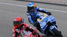 MotoGP - German Grand Prix - Sachsenring, Hohenstein-Ernstthal, Germany - July 11, 2026 Ducati Lenovo Team's Marc Marquez celebrates after winning the sprint race with runner up BK8 Gresini Racing MotoGP's Alex Marquez and third placed Pertamina Endu