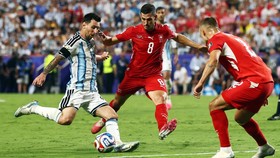 Soccer Football - FIFA World Cup 2026 - Quarter Final - Argentina v Switzerland - Kansas City Stadium, Kansas City, Missouri, U.S. - July 11, 2026 Argentina's Lionel Messi in action with Switzerland's Remo Freuler and Miro Muheim REUTERS/Amanda Perob