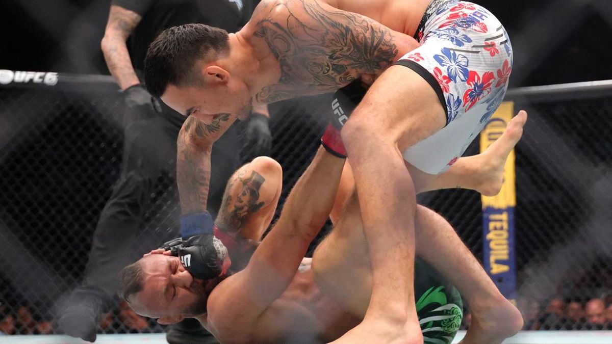 FOTO: Nahas Nasib McGregor Kalah TKO dari Holloway di UFC 329