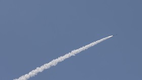 This picture taken from a position in the Upper Galilee region in northern Israel shows an Israeli Iron Dome missile streaking accross the sky to intercept incoming projectiles on May 31, 2026. Israel's military said on May 31 its forces were advanci