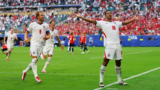 Soccer Football - FIFA World Cup 2026 - Quarter Final - Norway v England - Miami Stadium, Miami Gardens, Florida, U.S. - July 11, 2026 England's Jude Bellingham celebrates scoring their second goal with England's Harry Kane and John Stones REUTERS/Mi