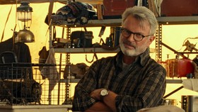 Sam Neill sebagai Alan Grant dalam film Jurassic World: Dominion (2022).