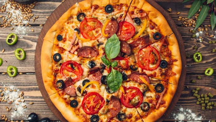 Hal yang Terjadi pada Tubuh saat Keseringan Mengonsumsi Pizza