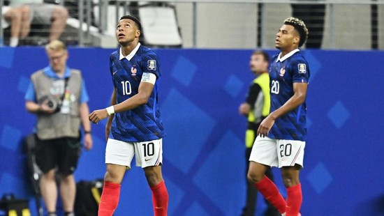 Soccer Football - FIFA World Cup 2026 - Semi Final - France v Spain - Dallas Stadium, Arlington, Texas, U.S. - July 14, 2026 France's Kylian Mbappe and Desire Doue look dejected after the match IMAGN IMAGES via Reuters/Maria Lysaker