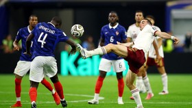 Soccer Football - FIFA World Cup 2026 - Semi Final - France v Spain - Dallas Stadium, Arlington, Texas, U.S. - July 14, 2026 France's Dayot Upamecano in action with Spain's Fabian Ruiz REUTERS/Albert Gea
