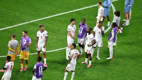 Soccer Football - FIFA World Cup 2026 - Semi Final - England v Argentina - Atlanta Stadium, Atlanta, Georgia, U.S. - July 15, 2026
England players look dejected on the pitch after the match as they are eliminated from the World Cup REUTERS/Carlos Ba