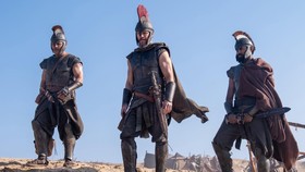 Center L to R: Jimmy Gonzales is Cepheus, Matt Damon is Odysseus and Himesh Patel is Eurylochus in THE ODYSSEY, written, produced, and directed by Christopher Nolan.