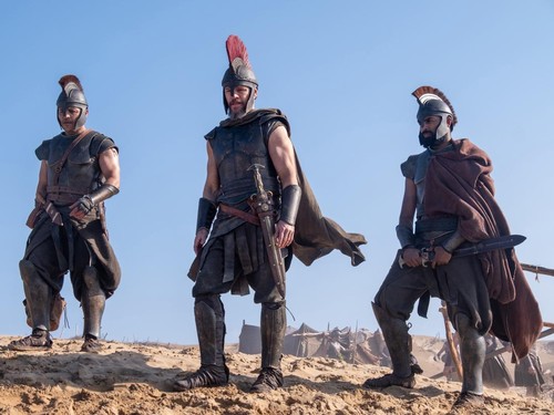 Center L to R: Jimmy Gonzales is Cepheus, Matt Damon is Odysseus and Himesh Patel is Eurylochus in THE ODYSSEY, written, produced, and directed by Christopher Nolan.