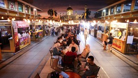 People have dinner in Bandar Seri Begawan, Brunei, July 15, 2026. REUTERS/Hasnoor Hussain