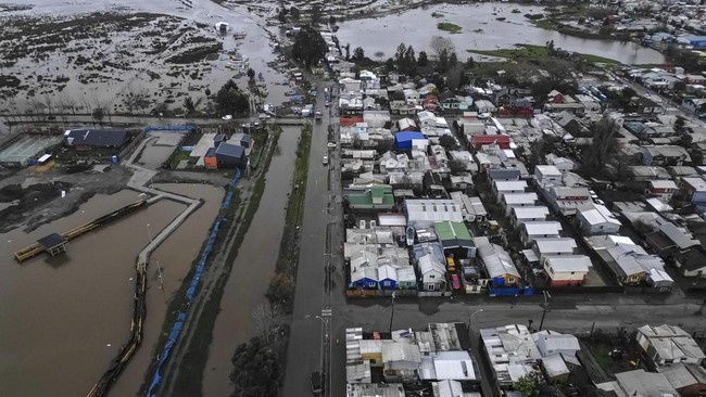 A drone view of a flooded area caused by the rain during a weather front that led the Chilean authorities to declare a preventive state of emergency at the start of the week, in Arauco, Chile July 16, 2026. REUTERS/Juan Gonzalez