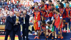 Soccer Football - FIFA World Cup 2026 - Final - Spain v Argentina - New York/New Jersey Stadium, East Rutherford, New Jersey, U.S. - July 19, 2026 U.S. President Donald Trump and FIFA president Gianni Infantino hand the World Cup trophy to Spain's Ro