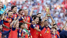 Soccer Football - FIFA World Cup 2026 - Final - Spain v Argentina - New York/New Jersey Stadium, East Rutherford, New Jersey, U.S. - July 19, 2026 Spain's Rodri lifts the World Cup trophy alongside teammates as they celebrate winning the World Cup RE