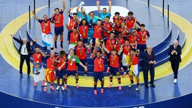 Soccer Football - FIFA World Cup 2026 - Final - Spain v Argentina - New York/New Jersey Stadium, East Rutherford, New Jersey, U.S. - July 19, 2026 Spain's Rodri lifts the World Cup trophy alongside teammates as they celebrate winning the World Cup as