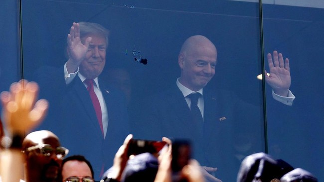 Soccer Football - FIFA World Cup 2026 - Final - Spain v Argentina - New York/New Jersey Stadium, East Rutherford, New Jersey, U.S. - July 19, 2026 U.S. President Donald Trump and FIFA President Gianni Infantino inside the stadium before the match REU