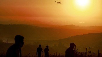 Palestinians watch as an Israeli Air Tractor AT-802 firefighting plane extinguishes a blaze near the village of Tell, adjacent to the Israeli settlement of Havat Gilad, west of Nablus in the occupied West Bank on July 18, 2026, after a reported arson