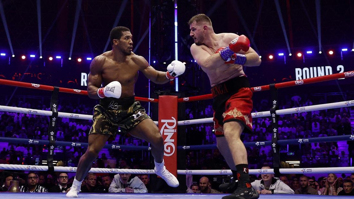 Boxing - The Comeback - Anthony Joshua v Kristian Prenga - Jeddah Superdome, Jeddah, Saudi Arabia - July 26, 2026 Kristian Prenga in action with Anthony Joshua during their heavyweight fight REUTERS/Ibraheem Abu Mustafa